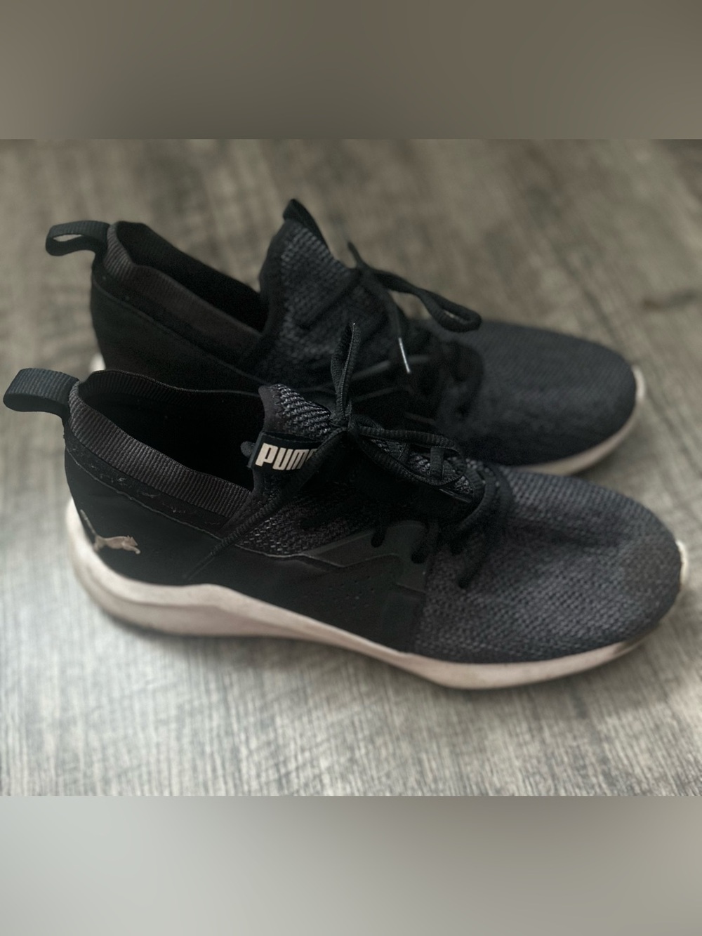 Puma Emergence running shoes with white soles